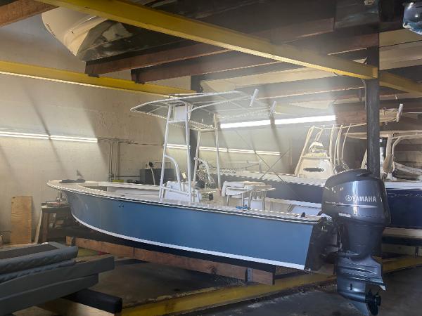 SeaCraft Barcone 21 CC 1971 SeaCraft Barcone 21 CC boat in storage with Yamaha outboard motor.