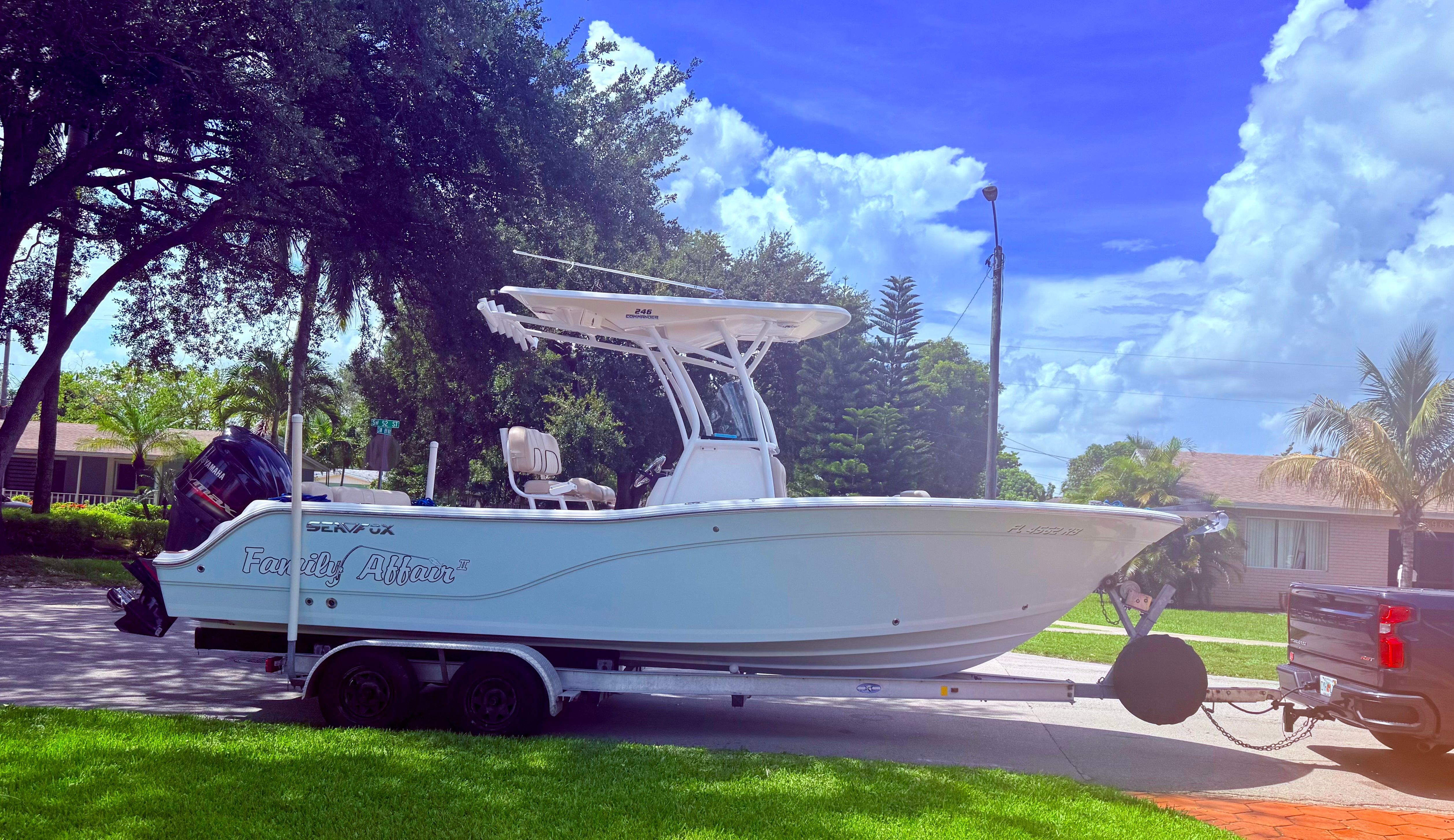 Sea Fox 246 Commander 2016 Sea Fox 246 Commander boat on trailer, parked in a suburban neighborhood.
