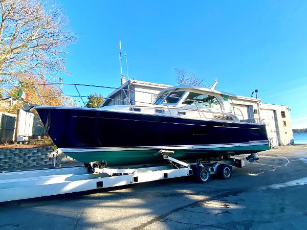 Sabre 38 Salon Express 2013 Sabre 38 Salon Express yacht on trailer, sunny day, marina background.