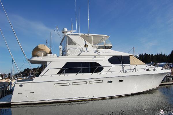 Ocean Alexander 548 Pilothouse 2004 Ocean Alexander 548 Pilothouse yacht docked in marina.
