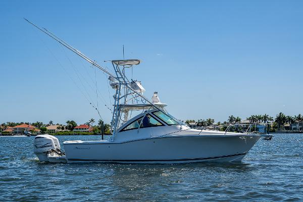 Albemarle 290 Express Fisherman 2018 Albemarle 290 Express Fisherman boat on calm water, clear sky background.