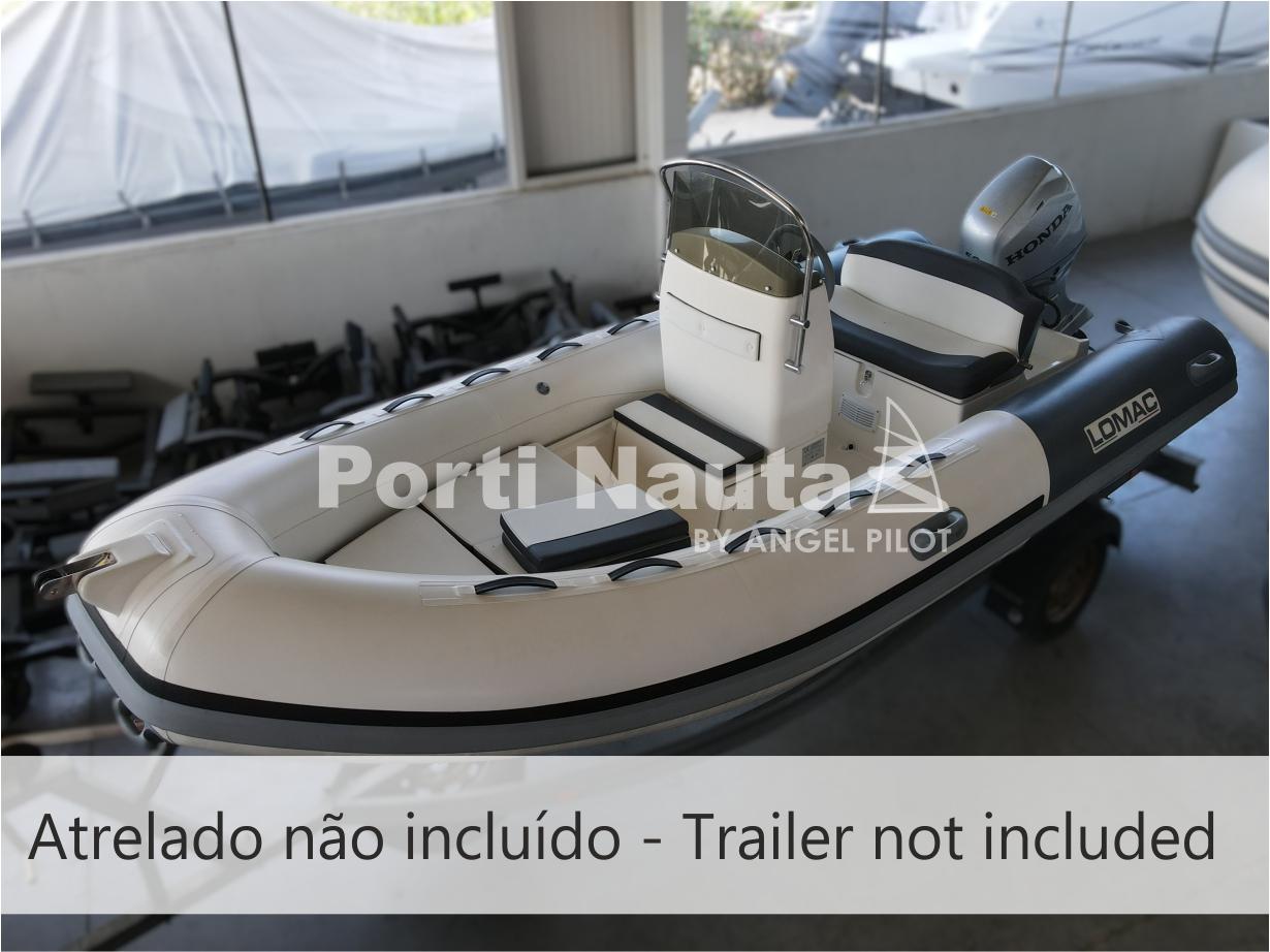 Lomac OK 460 2018 Lomac OK 460 inflatable boat displayed indoors, trailer not included.