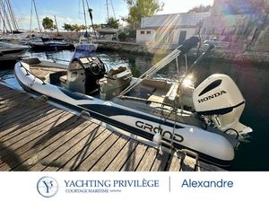 Grand Golden Line G750 2022 Grand Golden Line G750 boat with Honda engine docked at marina.