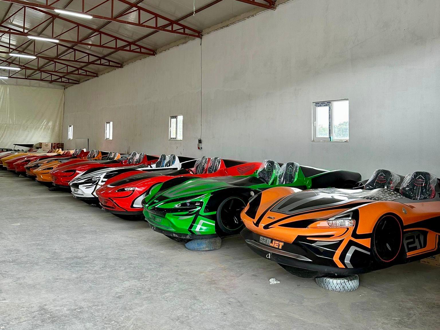 Fabbro Jet Car RR Lineup of colorful 2025 Fabbro Jet Car RR models in a spacious garage.