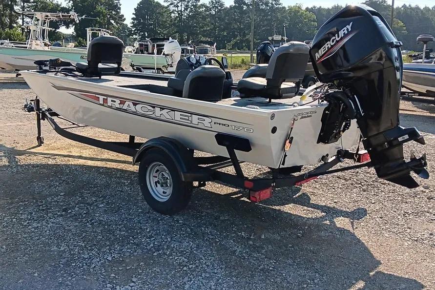 Tracker Pro 170 2026 Tracker Pro 170 boat with Mercury engine on trailer in outdoor setting.