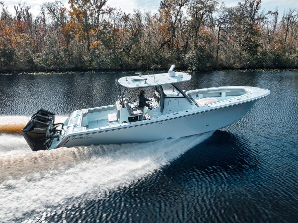 Front Runner 36 Center Console 2024 Front Runner 36 Center Console boat cruising on a scenic river.