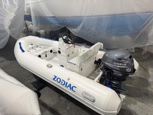 Zodiac Nomad 3.6 RIB Alu 2024 Zodiac Nomad 3.6 RIB Alu boat with Yamaha outboard motor in storage.