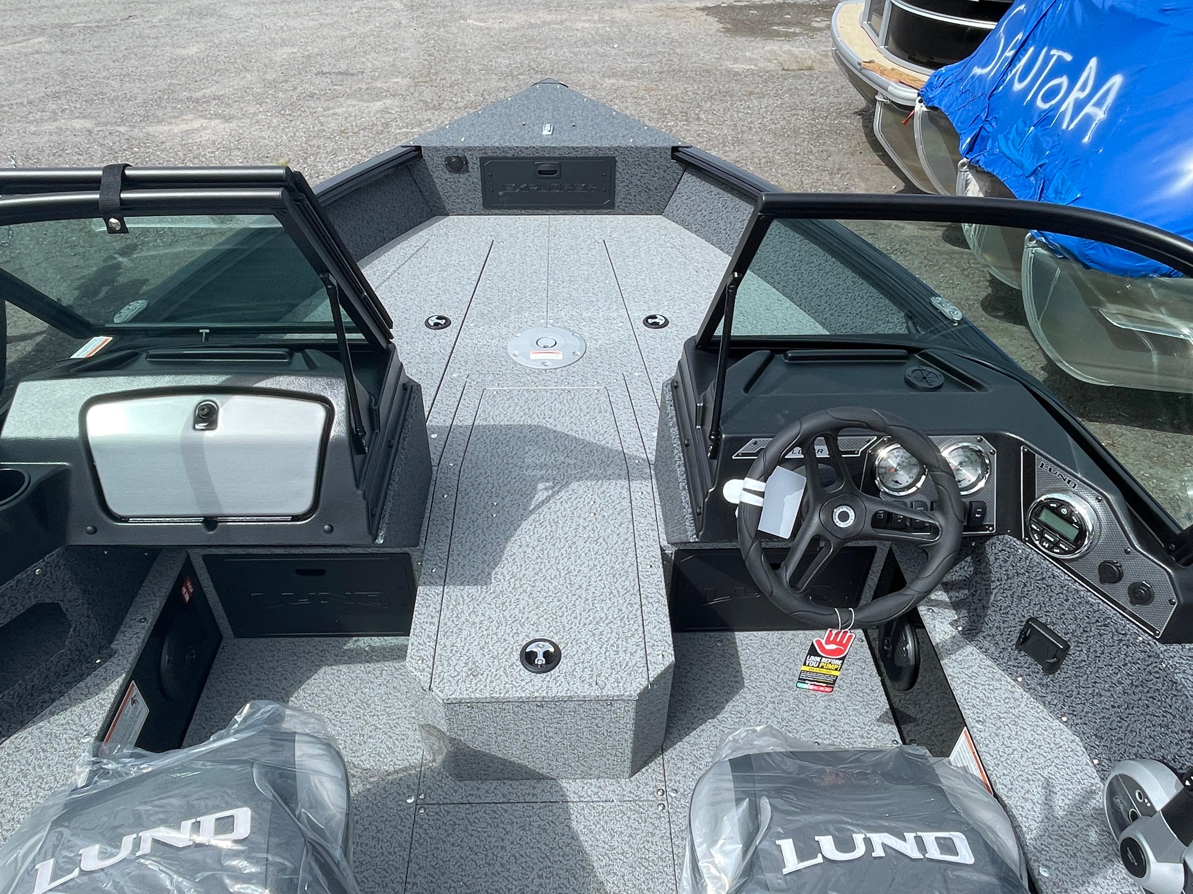 Lund 1800 Explorer Sport 2026 Lund 1800 Explorer Sport boat interior with steering wheel and dashboard.