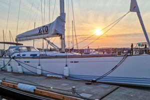 X-Yachts X50 2008 X-Yachts X50 sailboat docked at sunset, showcasing sleek design and elegant lines.