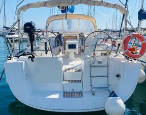 Beneteau Oceanis 43 2008 Beneteau Oceanis 43 sailboat docked, featuring dual steering wheels and a spacious cockpit.