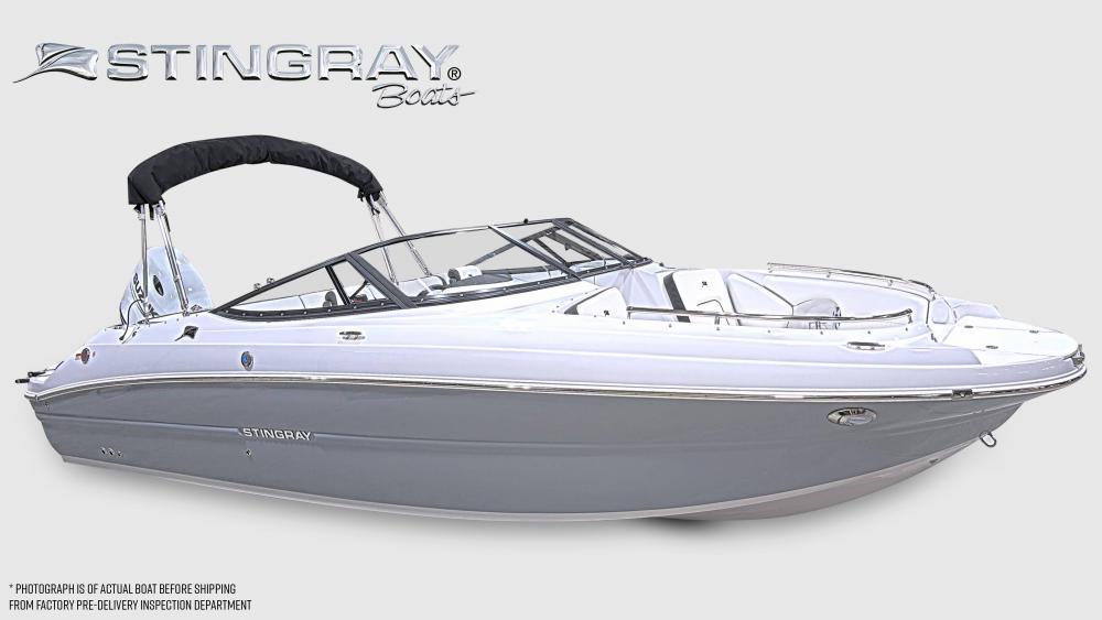 Stingray 231 DC 2025 Stingray 231 DC boat with sleek design and black canopy.