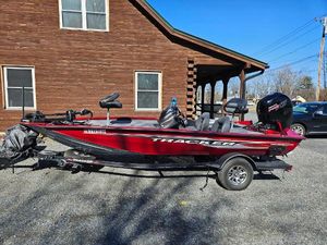 Tracker Pro Team 195 TXW Tournament Edition 2022 Tracker Pro Team 195 TXW Tournament Edition boat parked on gravel driveway.