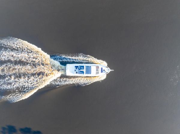 Viking 63 Motor Yacht Aerial view of 1989 Viking 63 Motor Yacht cruising on open water.