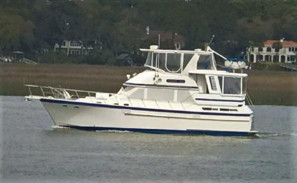 Jefferson 42 Sundeck Motor Yacht 1987 Jefferson 42 Sundeck Motor Yacht cruising on a calm waterway.