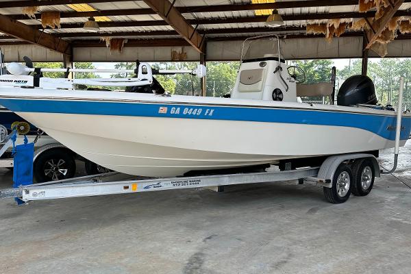 NauticStar 2200 Sport 2016 NauticStar 2200 Sport boat on trailer in covered storage.