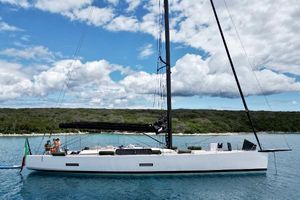 Mylius 19,95 Sleek 2011 Mylius MYLIUS 19,95 yacht sailing on calm waters under a cloudy sky.