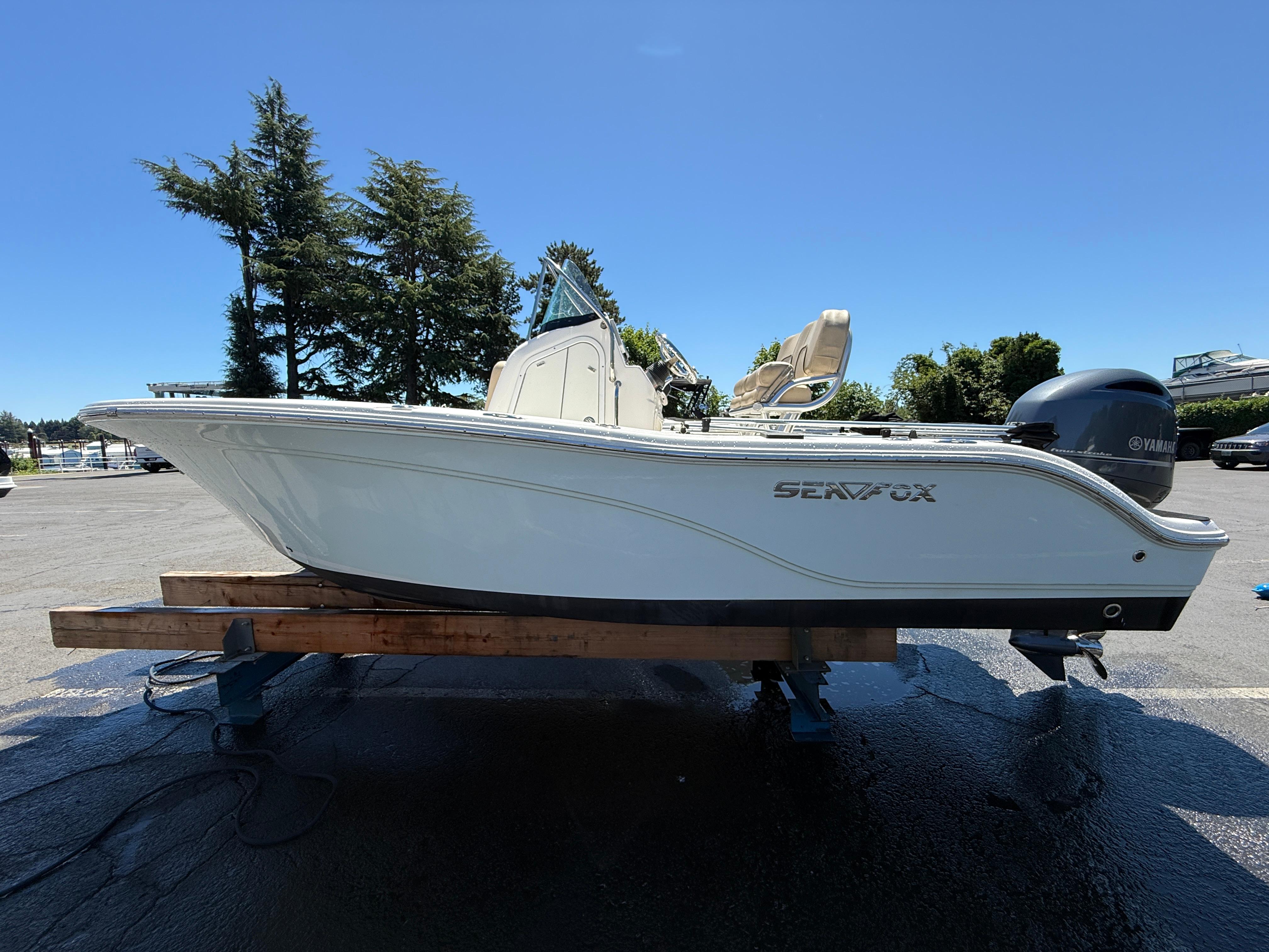 Sea Fox 186 Commander 2018 Sea Fox 186 Commander boat on display under clear blue sky.
