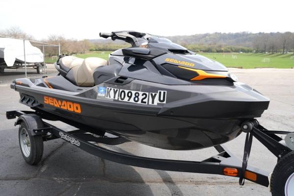 Sea-Doo GTX 230 2022 Sea-Doo GTX 230 jet ski on trailer, parked outdoors.