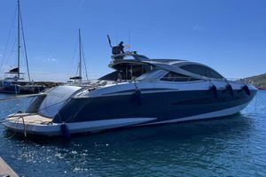 Canados 90 Luxury Canados 90 yacht from 2010 docked in a sunny marina.