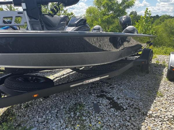 Vexus AVX 1880 2024 Vexus AVX 1880 boat on a trailer, parked on gravel.