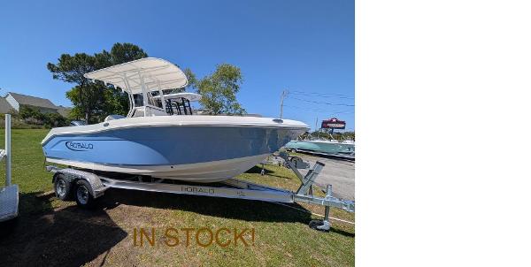 Robalo R202 Explorer 2025 Robalo R202 Explorer boat on trailer, in stock, displayed outdoors.