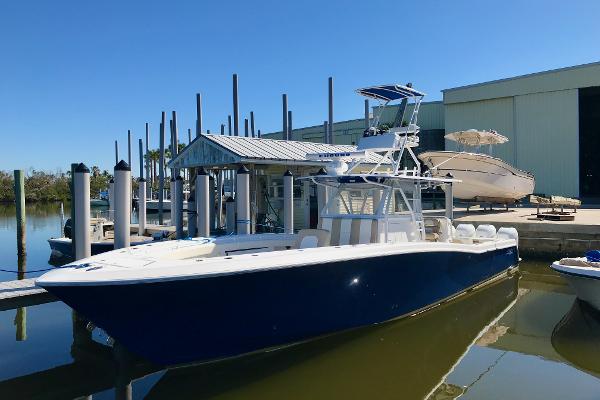 Invincible 42 Open Fisherman 2015 Invincible 42 Open Fisherman boat docked at marina.