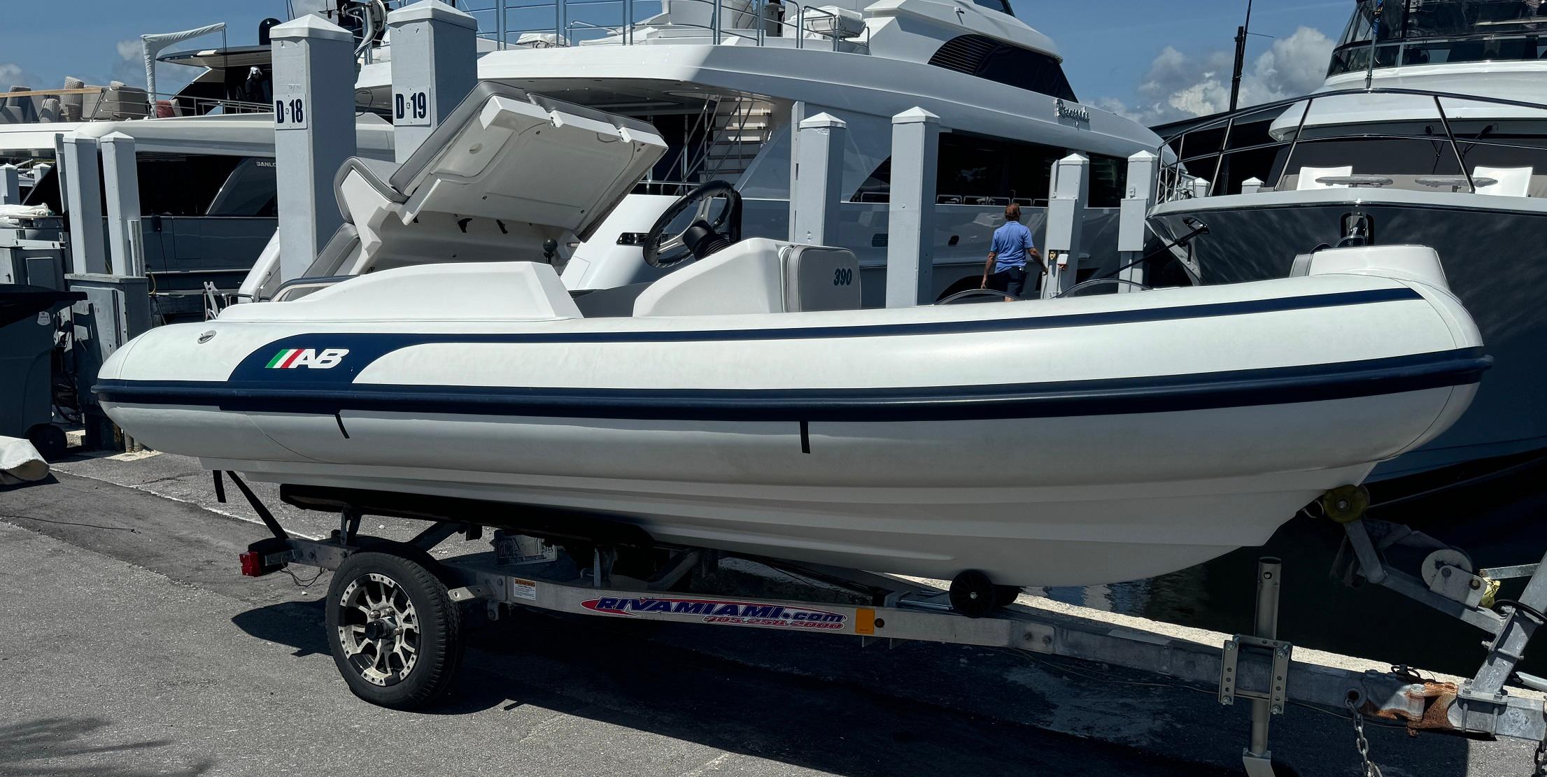 AB Inflatables ABJET 390XP 2024 AB Inflatables ABJET 390XP boat on trailer at marina.