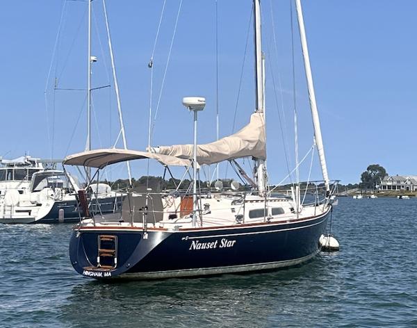 Sabre 362 1994 Sabre 362 sailboat named "Nauset Star" docked in calm waters.