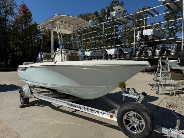 Key West 189 FS 2025 Key West 189 FS boat on trailer, parked outdoors in a marina setting.