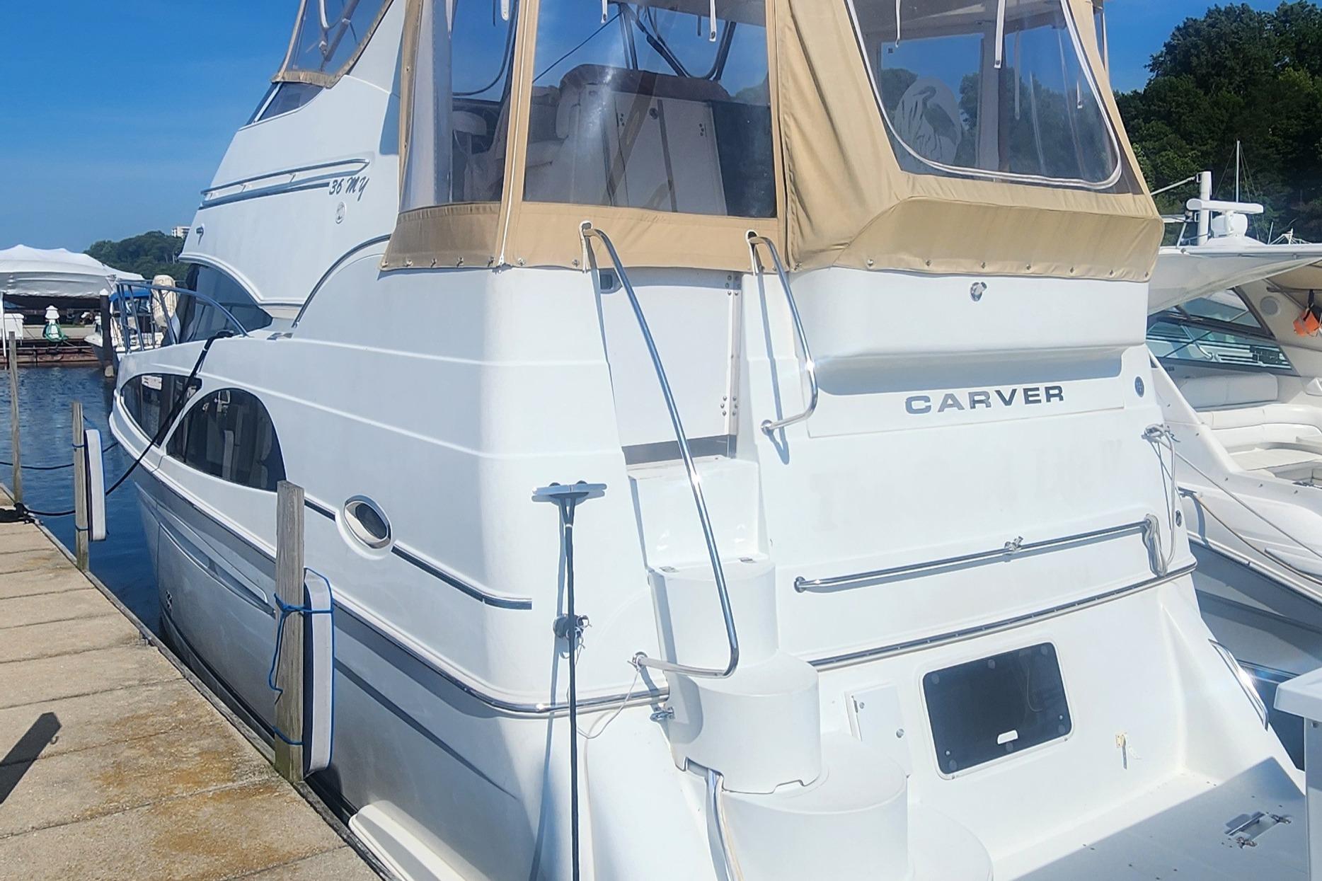 Carver 36 Aft Cabin Motor Yacht 2006 Carver 36 Aft Cabin Motor Yacht docked at marina, rear view.