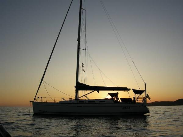 Dufour 44 2005 Dufour 44 sailboat at sunset on calm waters.