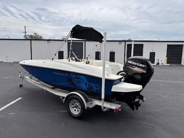 Bayliner Element 2020 Bayliner Element boat with Mercury outboard motor on trailer.