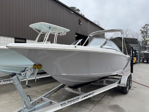 Key West 203 DFS 2025 Key West 203 DFS boat on trailer, parked outside a building.