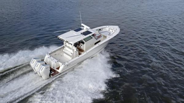 Scout 357 LXF 2025 Scout 357 LXF boat cruising on open water.