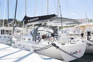 X-Yachts Xc 35 2018 X-Yachts Xc 35 sailboat docked in marina, featuring sleek design and modern amenities.
