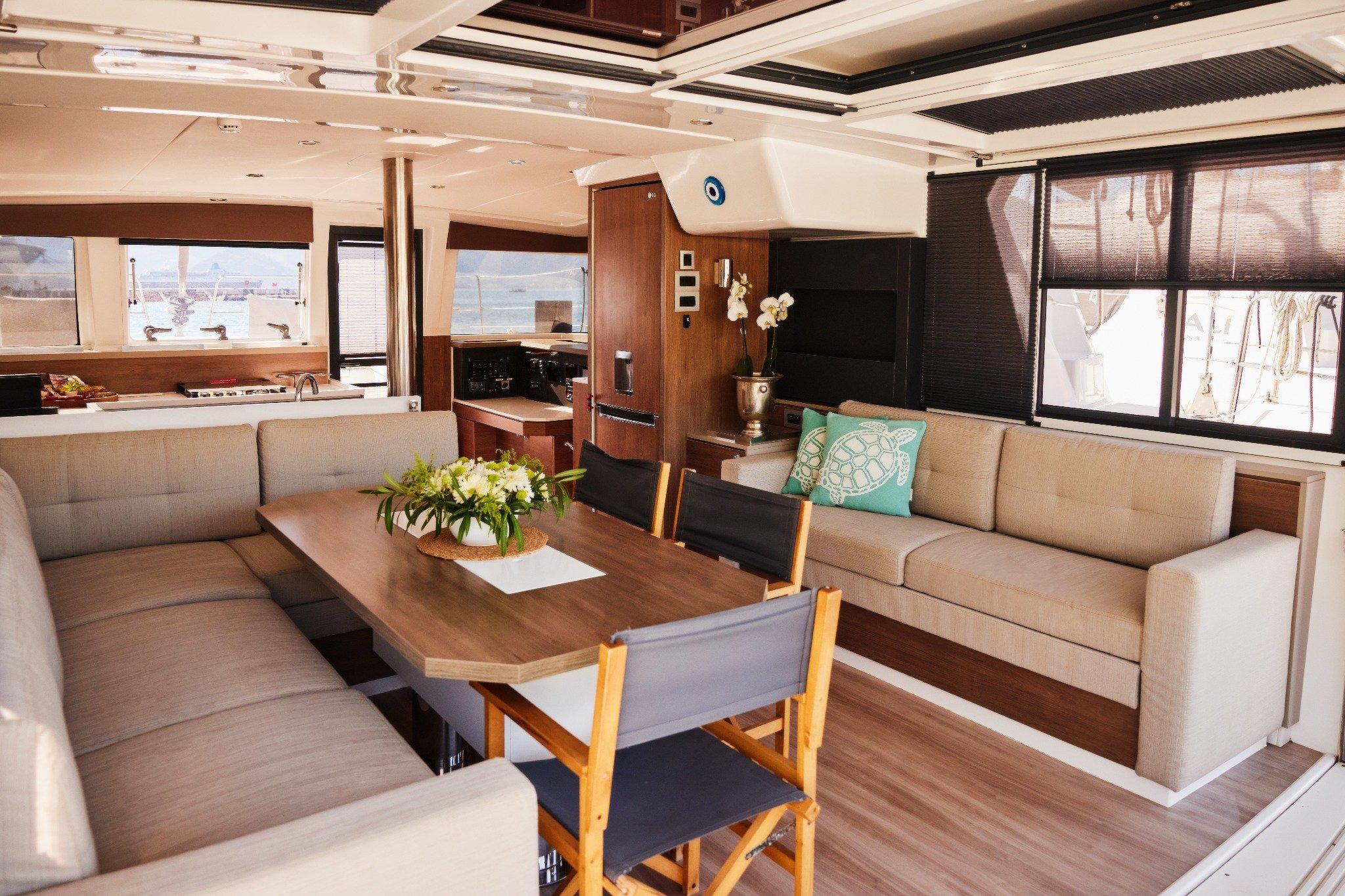 Bali 4.2 Luxurious interior of 2022 Bali 4.2 yacht with elegant seating and dining area.