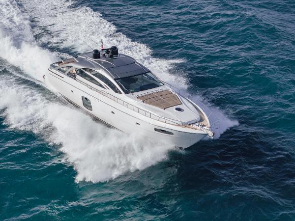 Pershing 70 2016 Pershing 70 yacht cruising on open sea, creating waves.
