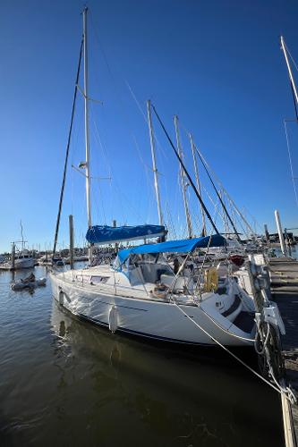 Jeanneau Sun Odyssey 36i 2009 Jeanneau 36i sailboat docked in marina under clear blue sky.