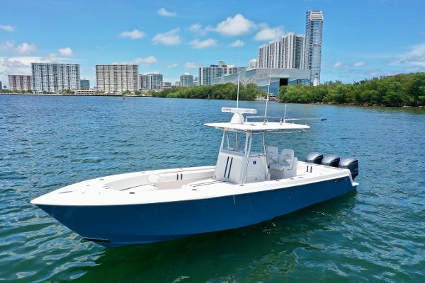 Contender 35 ST with SEAKEEPER 2017 Contender 35 ST boat on water with city skyline in background.