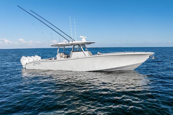 Yellowfin 39 2024 Yellowfin 39 boat on open water under clear blue sky.