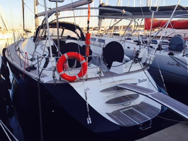 Jeanneau Sun Odyssey 54 DS 2004 Jeanneau Sun Odyssey 54 DS sailboat docked at marina, rear view.