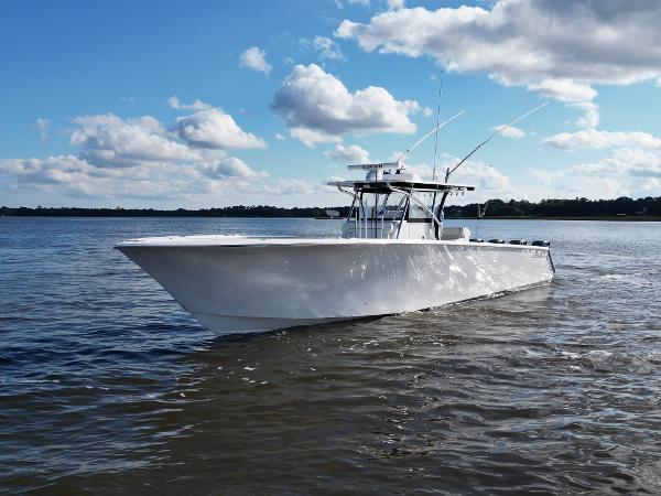 SeaHunter 45 Tournament 2015 SeaHunter 45 Tournament boat on calm water under a blue sky.