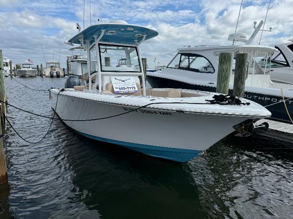 Sportsman Open 252 Center Console 2020 Sportsman Open 252 Center Console boat docked in marina.
