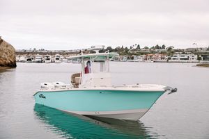 Carolina Skiff 27 HFC 2019 Carolina Skiff 27 HFC boat on calm water near marina.
