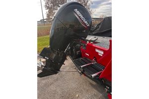 Tracker Targa V-18 WT 2026 Tracker Targa V-18 WT boat with Mercury outboard motor, parked outdoors.