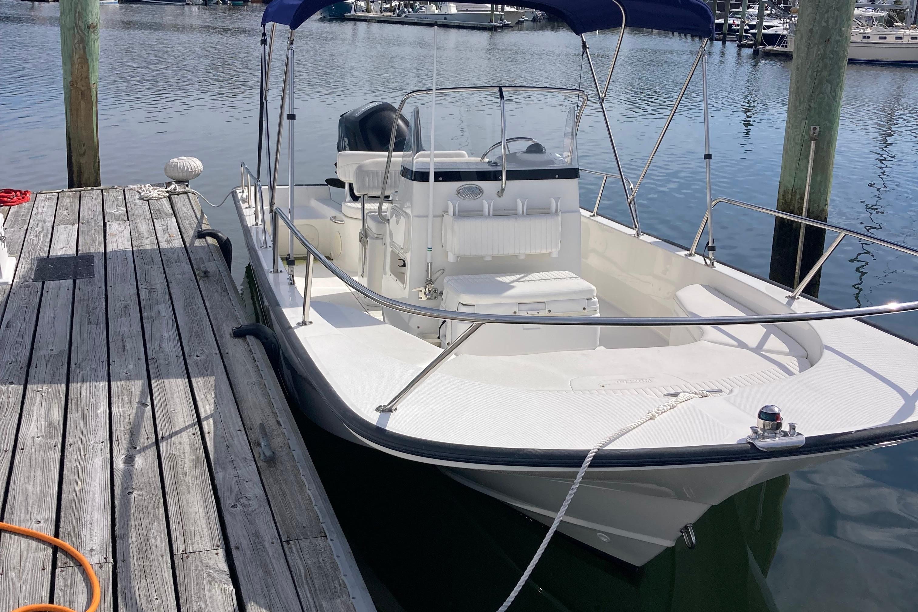 Boston Whaler 190 Montauk 2011 Boston Whaler 190 Montauk boat docked at marina, featuring sleek design and spacious deck.