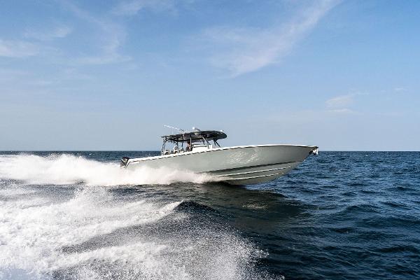 Contender 44 ST Contender 2025 44ST boat cruising on open water.