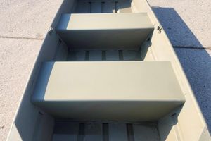 Tracker Grizzly 10 Jon 2026 Tracker Grizzly 10 Jon boat interior with bench seats, shown on concrete surface.