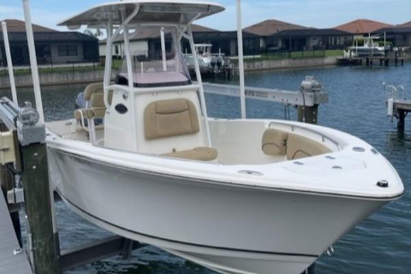 NauticStar 22 XS Offshore 2019 NauticStar 22 XS Offshore boat docked in a marina.