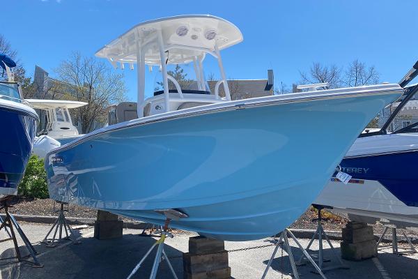 Sea Pro 222 Center Console 2024 Sea Pro 222 Center Console boat in light blue on display.
